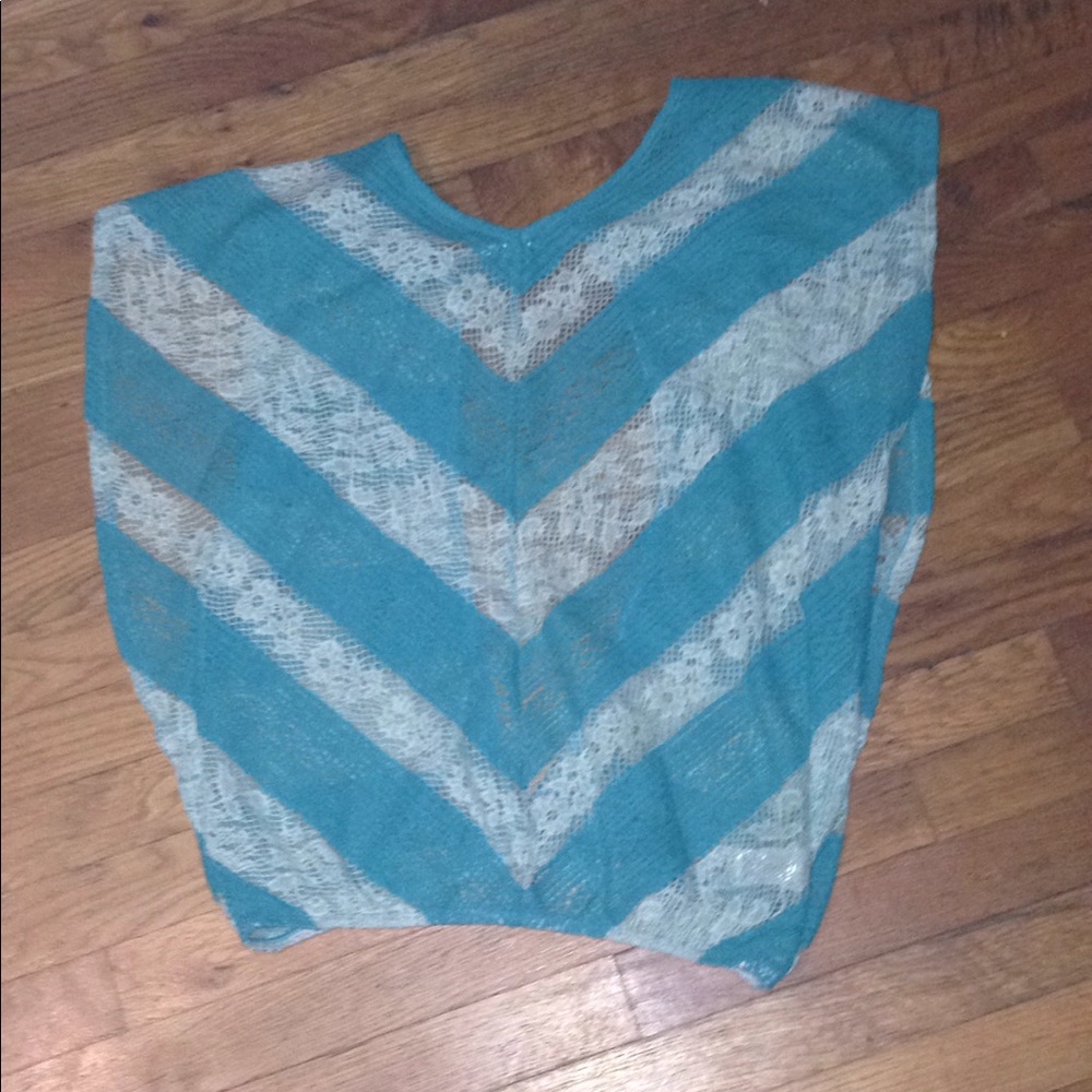 A blue and white open backed shirt.
